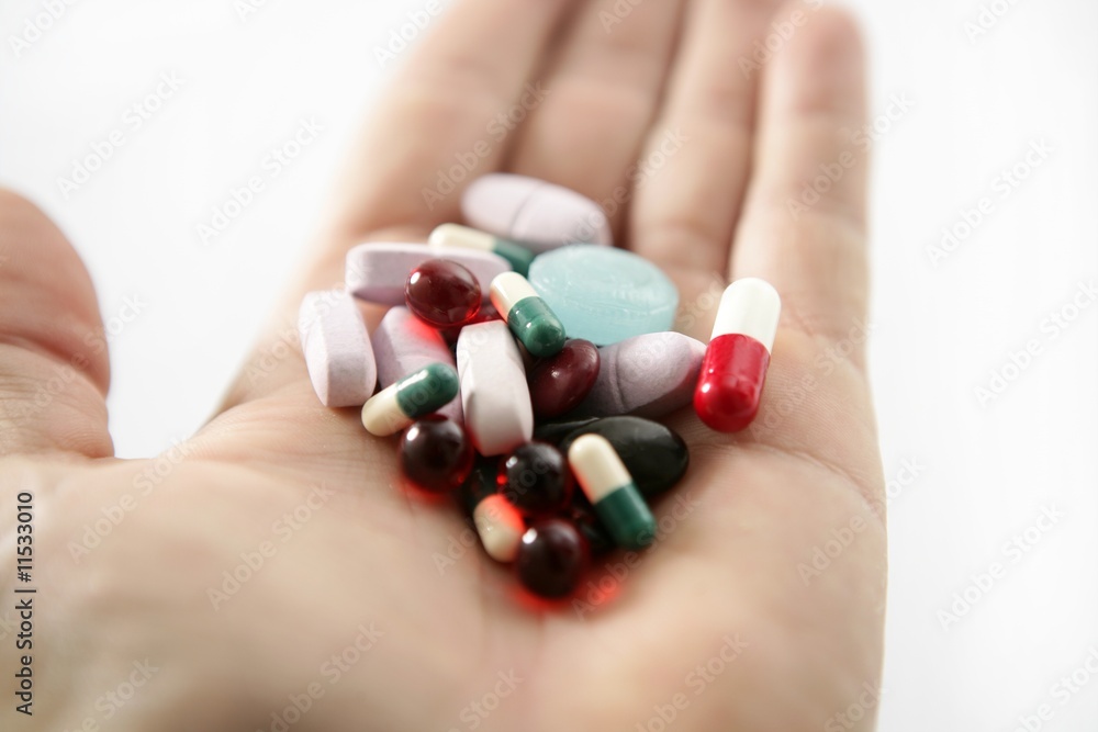 pills over white, health or suicide pills over white, health or suicide