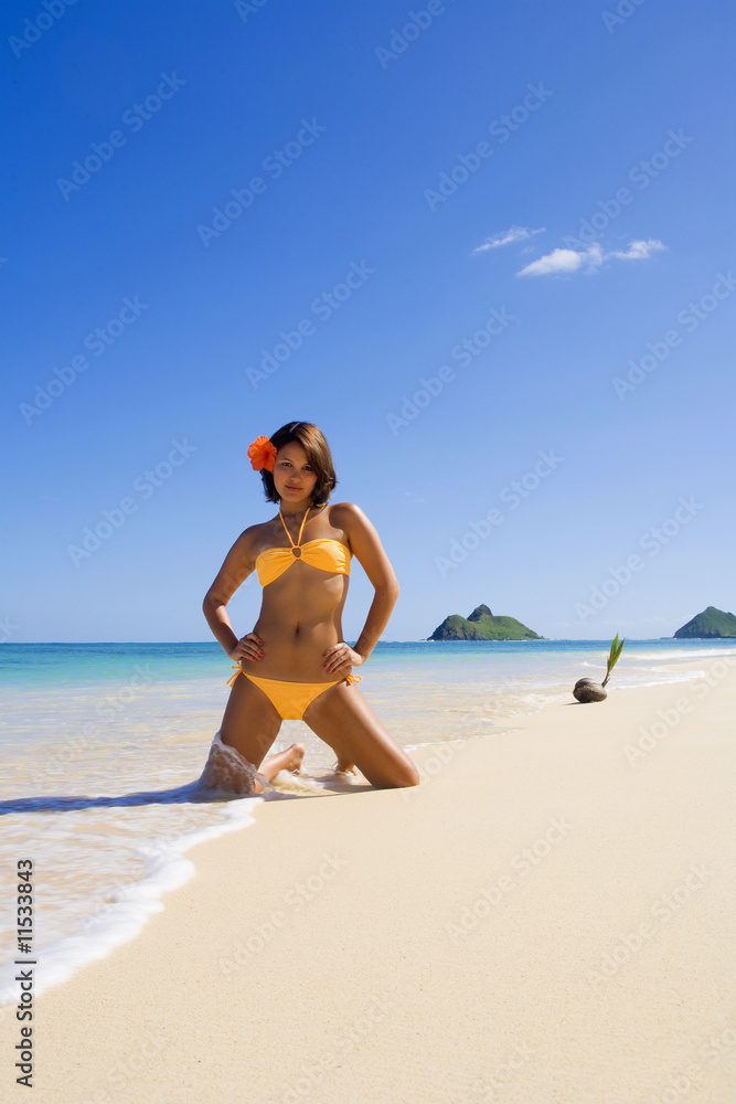 beautiful Polynesian girl in  bikini on a Hawaii beach