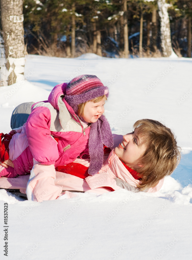 Obraz premium Mother playing with baby