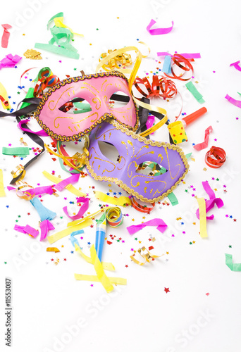 carnival masks and colorful confetti on white