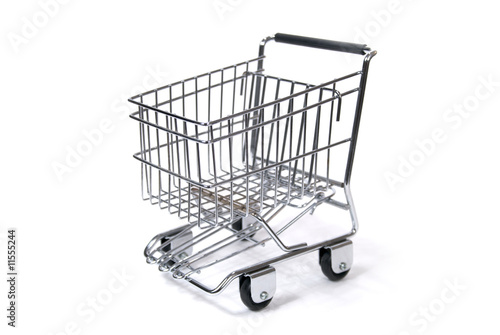 A Toy Sized Shopping Cart Against White Background