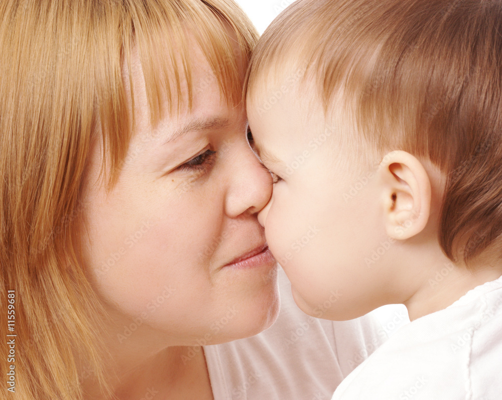 Happy mother and child looking at each other Happy mother and child looking at each other