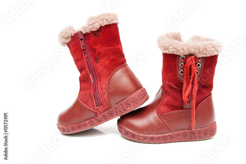 old red winter boots for baby isolated on white