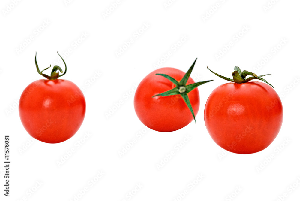 Closeup of cherry tomatoes isolated on white background Closeup of cherry tomatoes isolated on white background