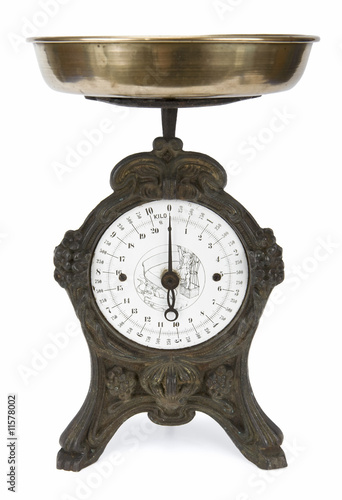 Vintage weight scale isolated on white. Clipping path incl.