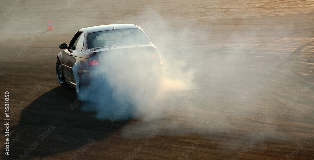Car drifting with smoke trail