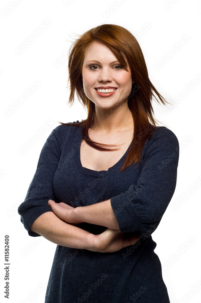 Beautiful young red haired woman isolated on a white background