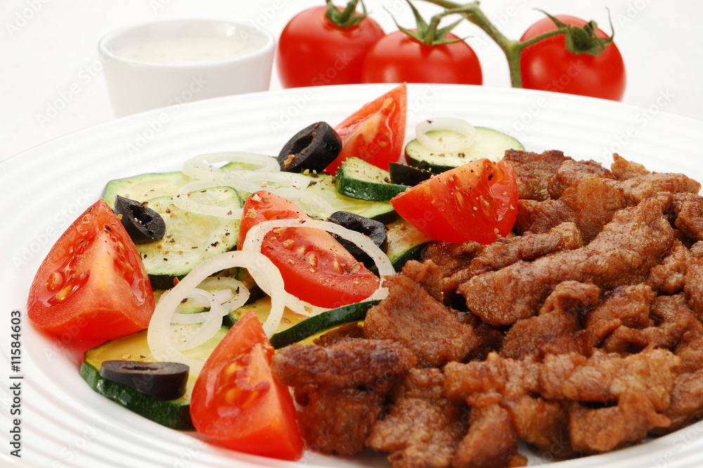 Grilled meat with vegetable salad Grilled meat with vegetable salad
