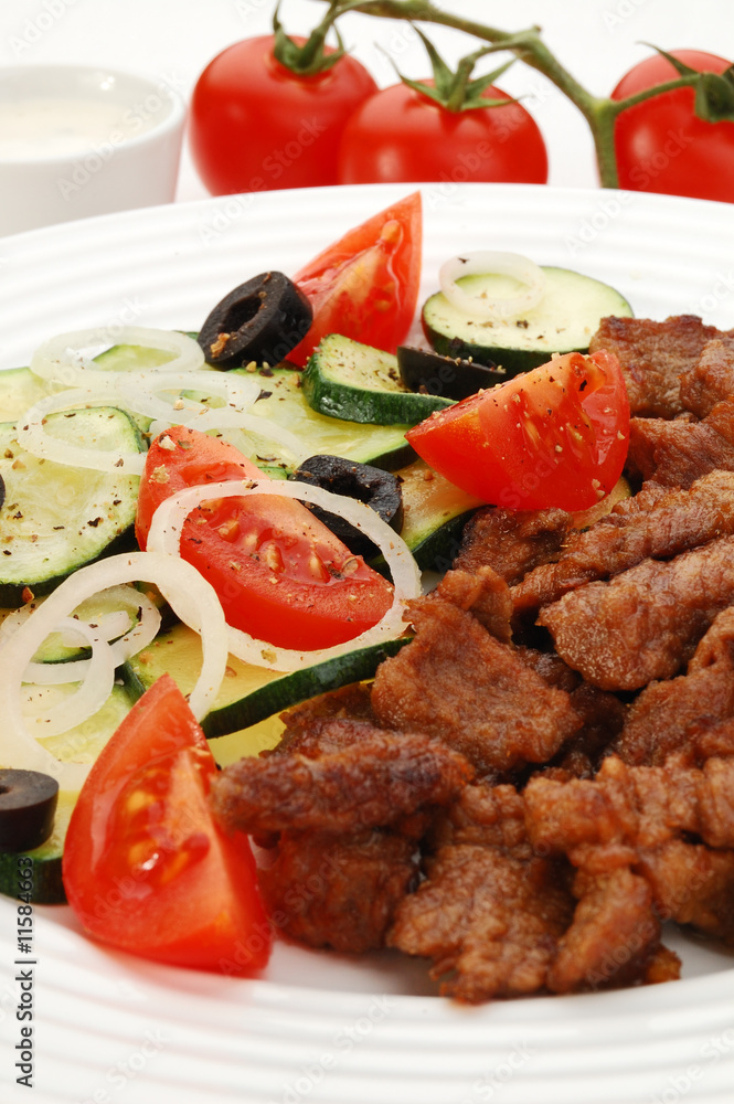 Grilled meat with vegetable salad Grilled meat with vegetable salad