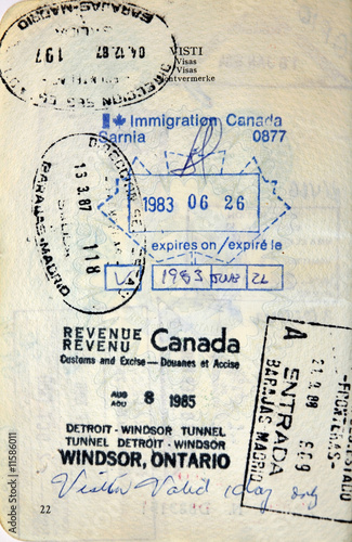 Italian passport. Canada visa. Spain,Canada border stamps
