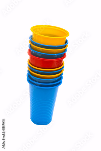 Stacked plastic cups isolated on white.