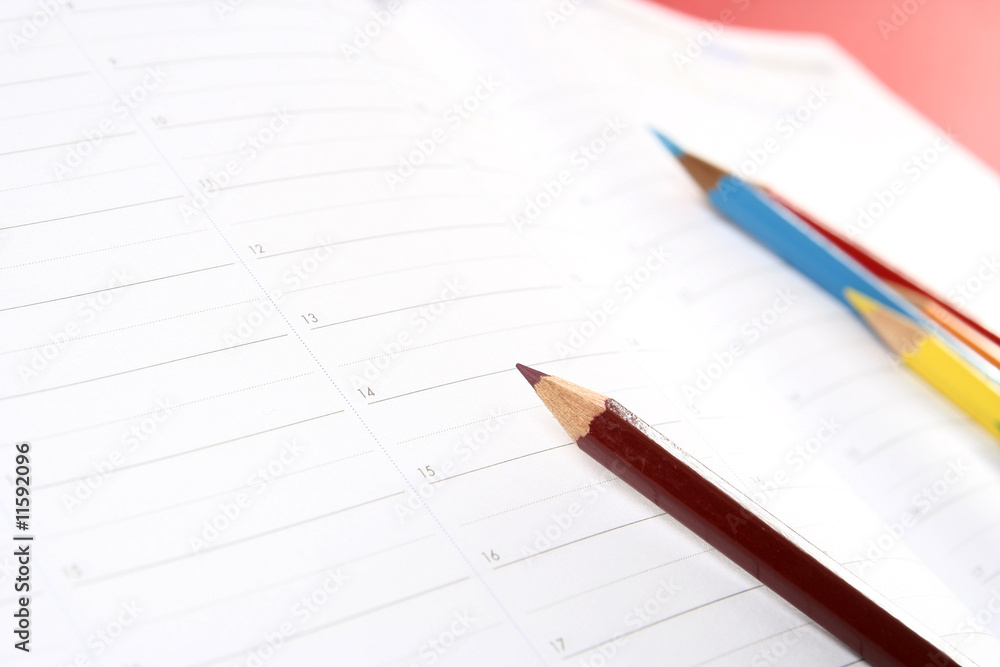 Color pencil and agenda Color pencil and agenda
