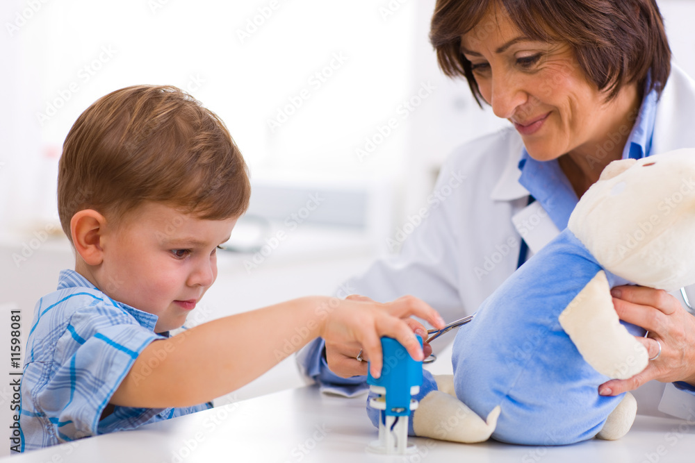 Senior doctor and boy Senior doctor and boy