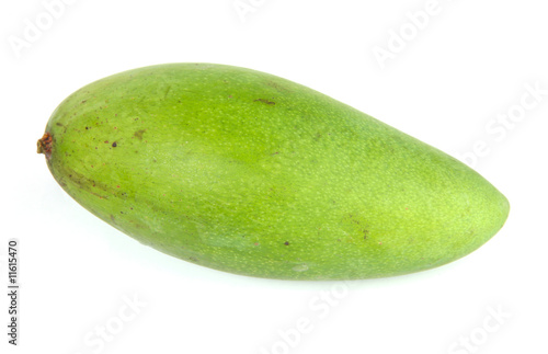 green unripe mango on a white background