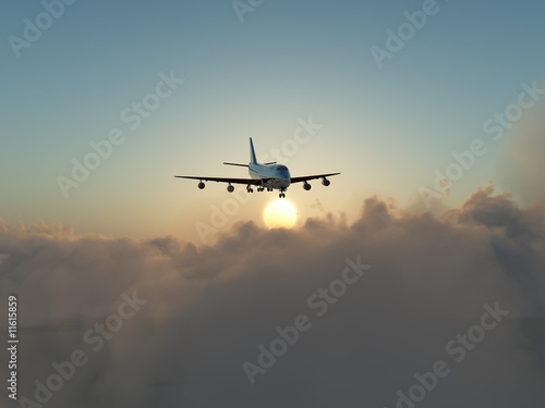Plane In Flight Over Clouds