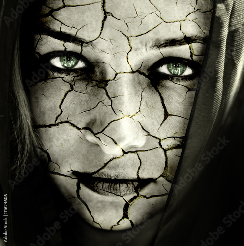 Face of woman with cracked skin