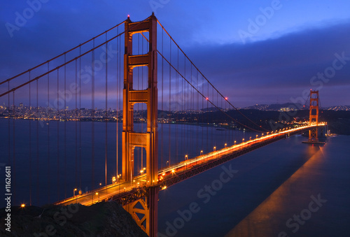 Golden Gate Bridge Sunset Pink Skies Evening with Lights of San