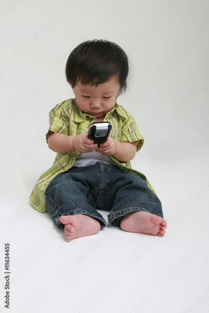 Cute Toddler with Mobile Phone Cute Toddler with Mobile Phone