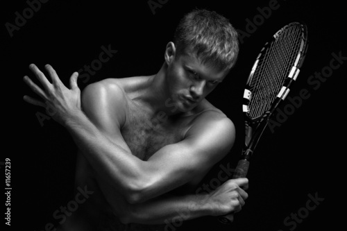 Tennis player with racket © Fisher Photostudio