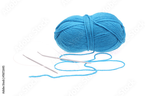 Blue woolen thread with aluminium knitting needles