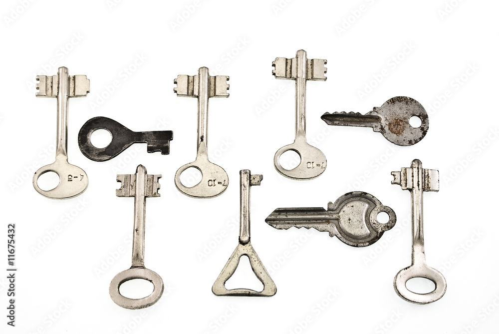 set of old keys isolated on white background set of old keys isolated on white background