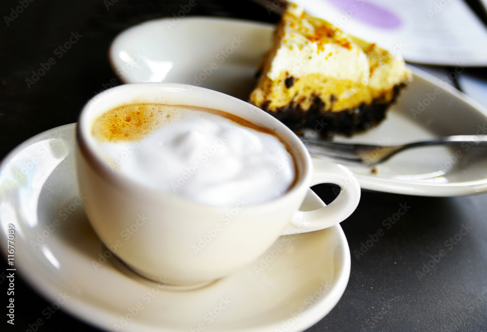 cup of frothy coffee, and chocolate cream pie cup of frothy coffee, and chocolate cream pie