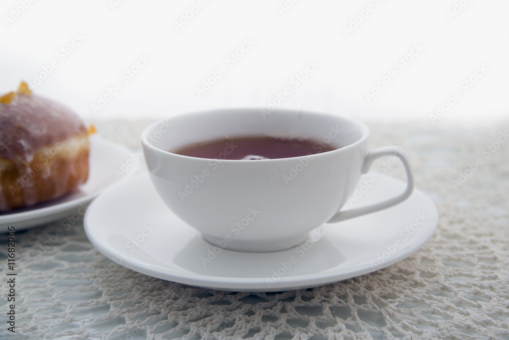 donut and cup of tea donut and cup of tea