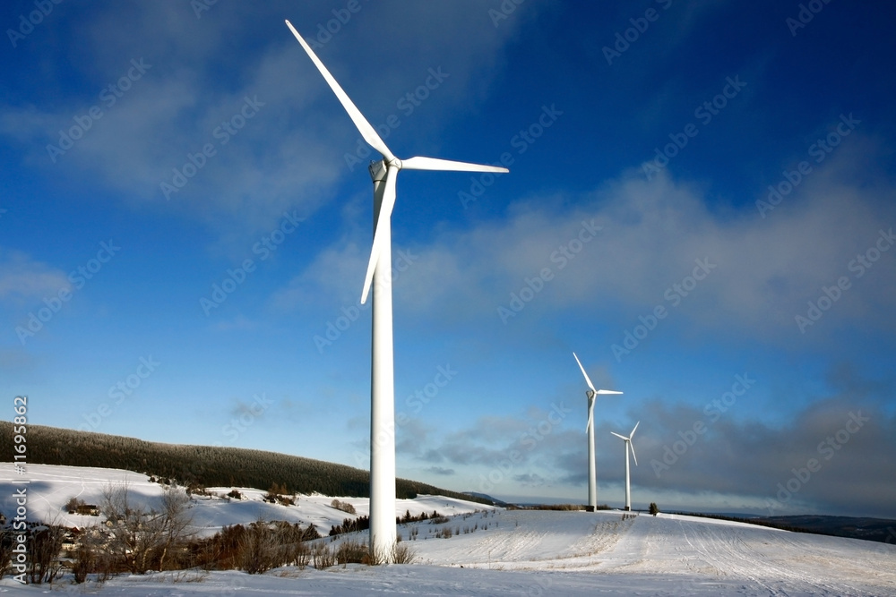 Fototapeta premium wind power station in snowy landcape