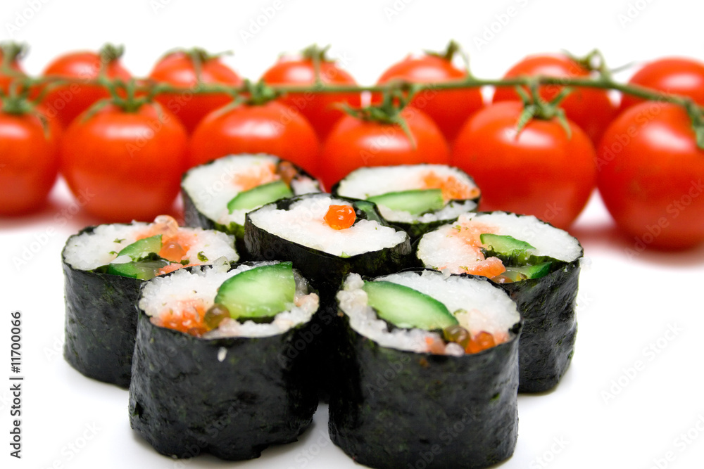 Japanese sushi and ripe red tomatoes Japanese sushi and ripe red tomatoes