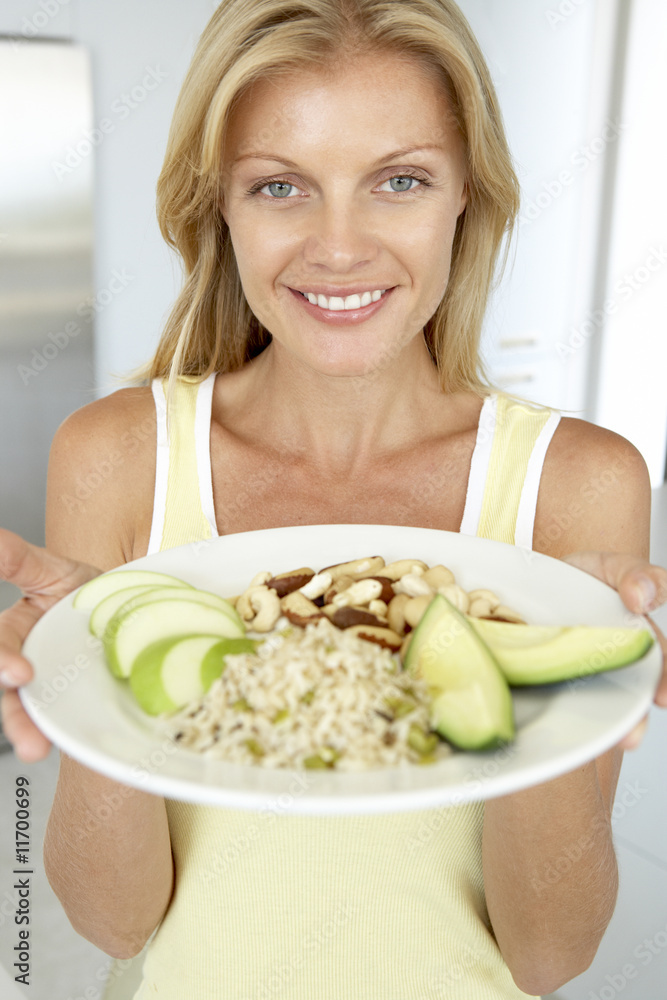 Mid Adult Woman Holding Plate With Healthy Foods Mid Adult Woman Holding Plate With Healthy Foods