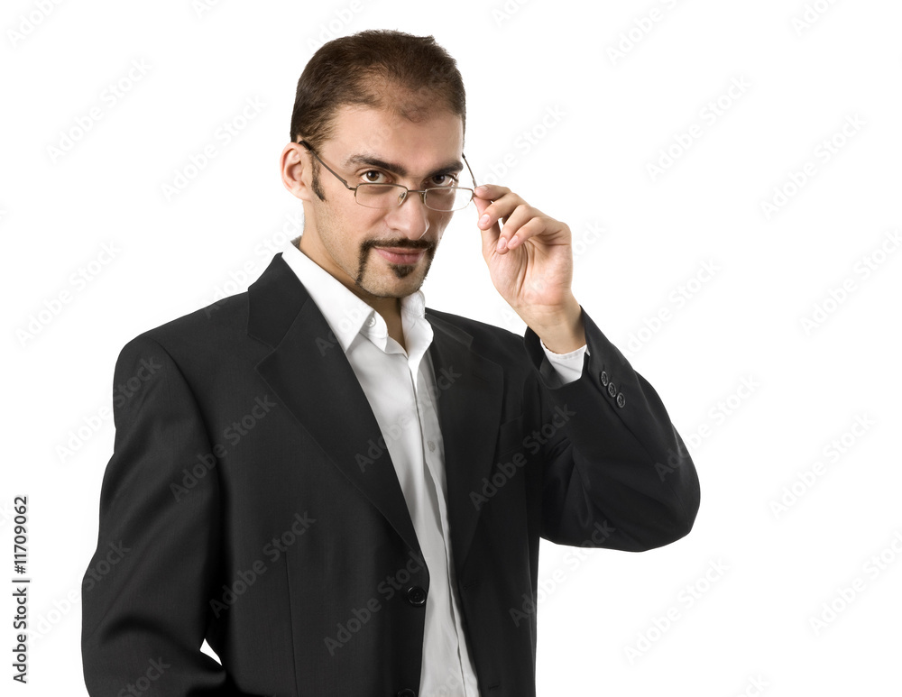 Portrait of a young businessman standing against isolated white Portrait of a young businessman standing against isolated white