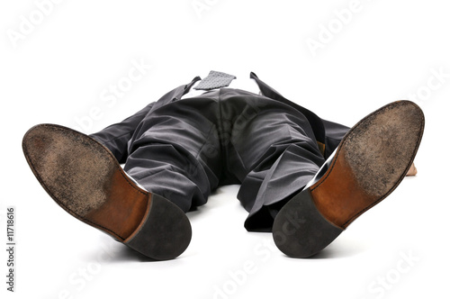 Businessman laying down on white background