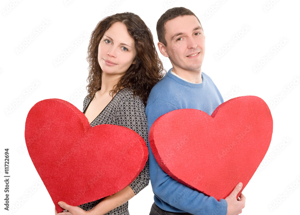 loving couple holding hearts loving couple holding hearts