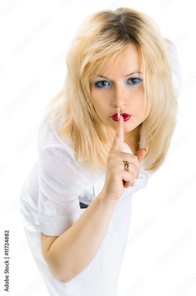 Secret. Woman shows hush, on white background Secret. Woman shows hush, on white background