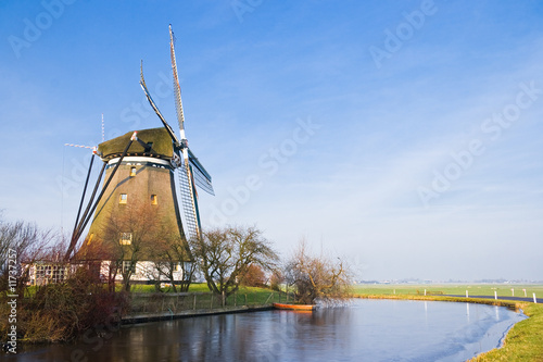 Canvas Print Dutch polder landscape with windmill