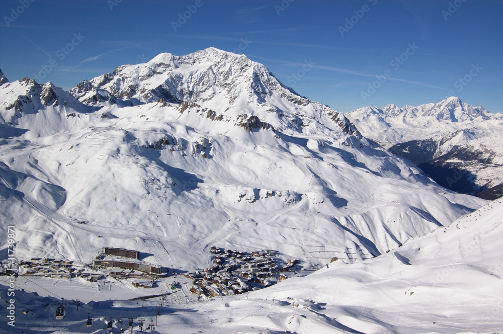 winter mountain landscape with resort village