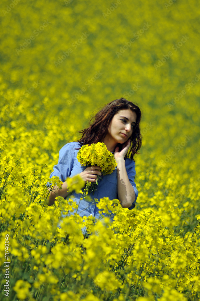 beautiful girl in a wild mustard field beautiful girl in a wild mustard field