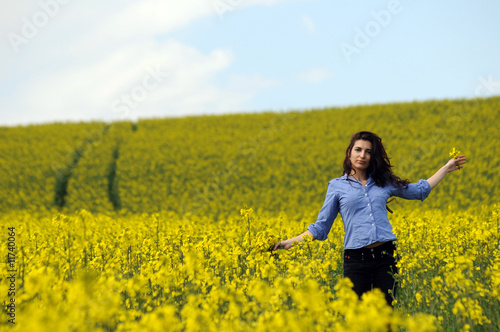 beautiful girl in a wild mustard field © Ioan Valentin Pocan