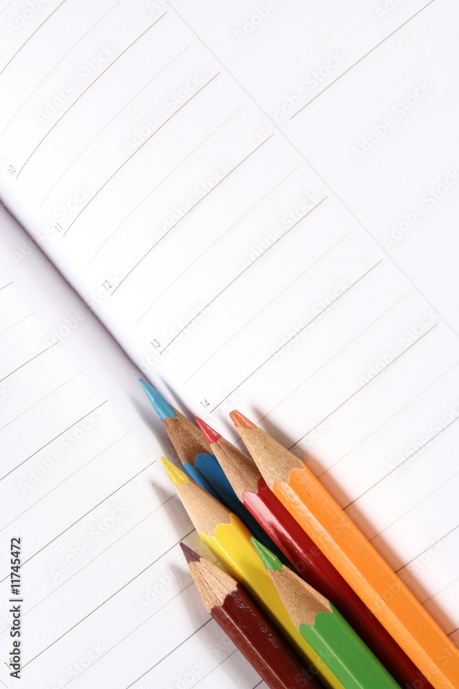 Color pencil and agenda Color pencil and agenda