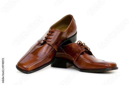 Brown shoes isolated on the white background © Elnur