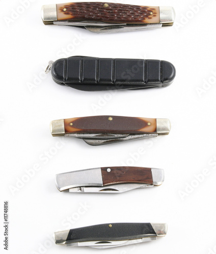 Assorted old pocket knifes closed photo