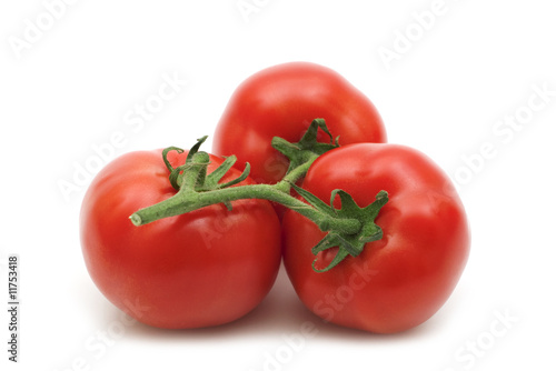 three fresh tomatoes on white background © Andre