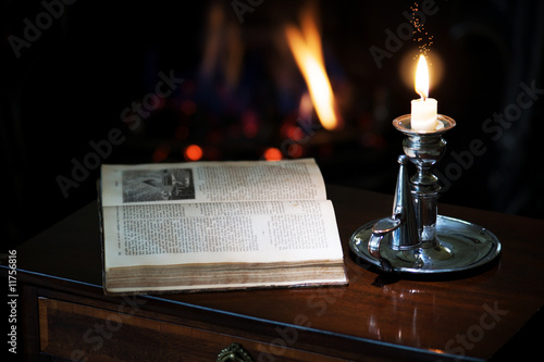 Fototapeta fireside with sparkling candle