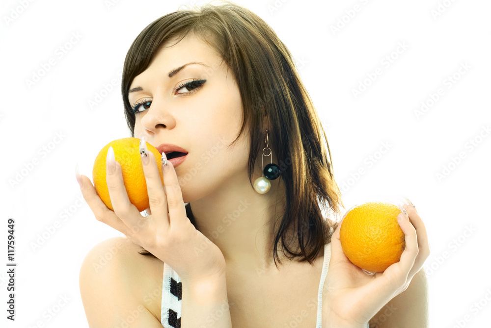 sexy brunette woman eating oranges sexy brunette woman eating oranges