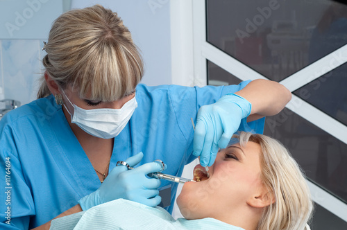 Canvas Print dentist at work, anaesthesia injection