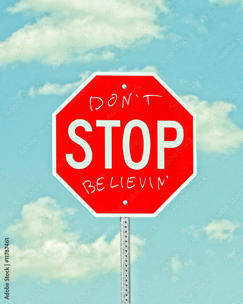 Obraz premium stop sign with graffiti