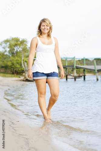 Beautiful young caucasian woman on the beach