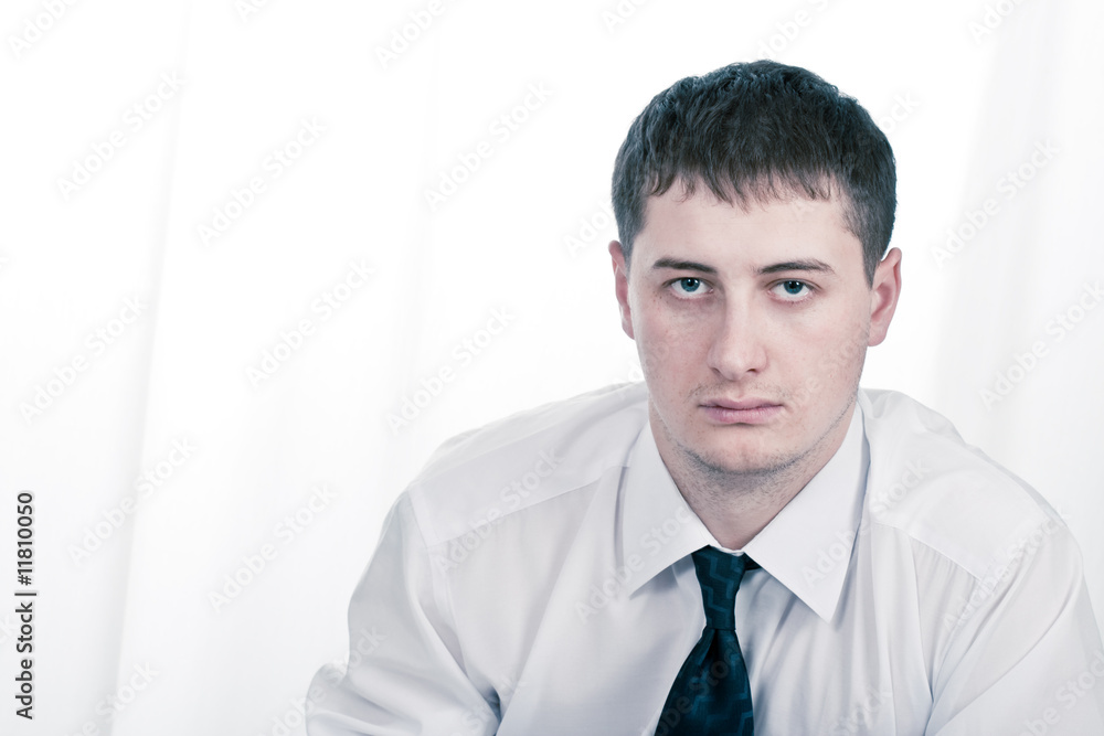 young adult serious businessman young adult serious businessman