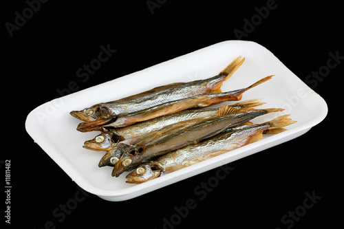 Dried capelin in the plastic container