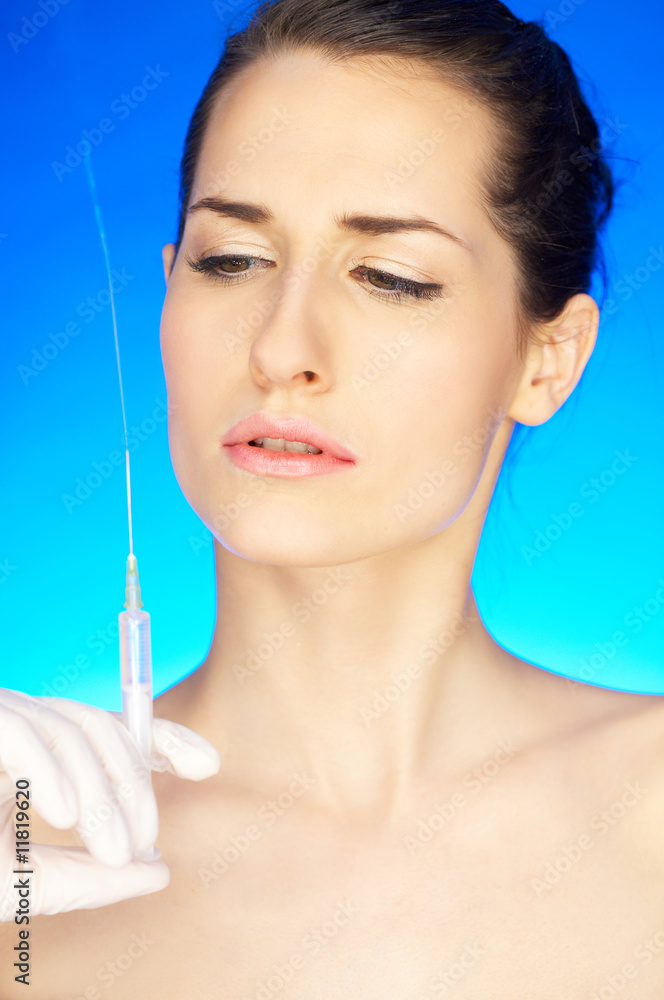 Portrait of Beautiful woman, she recieving a botox injection